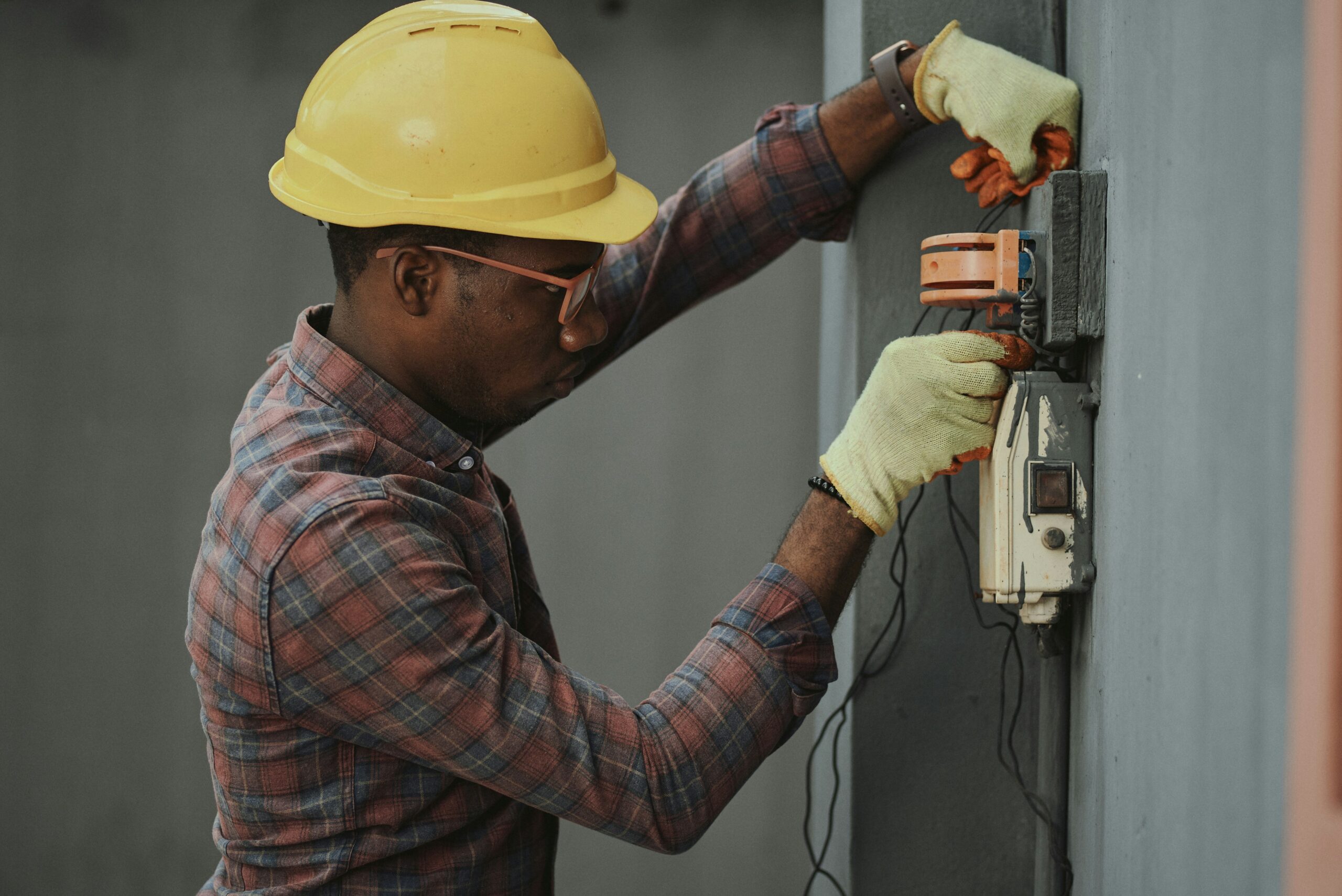 a professional technician working in electrical system