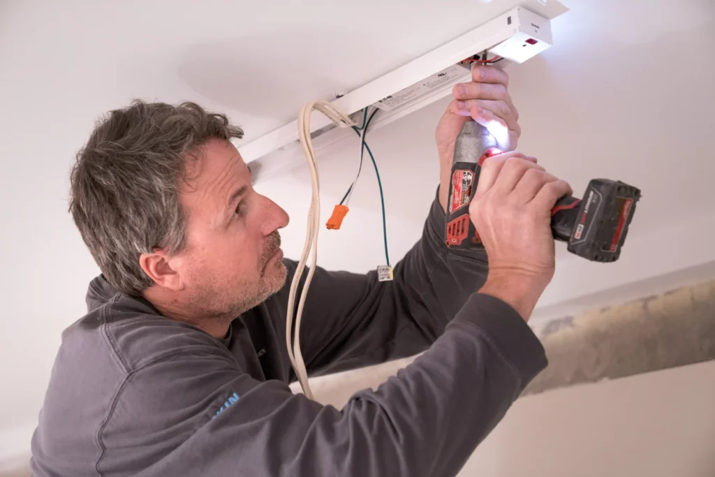 a electrician performing electrical services in minnetonka, mn.