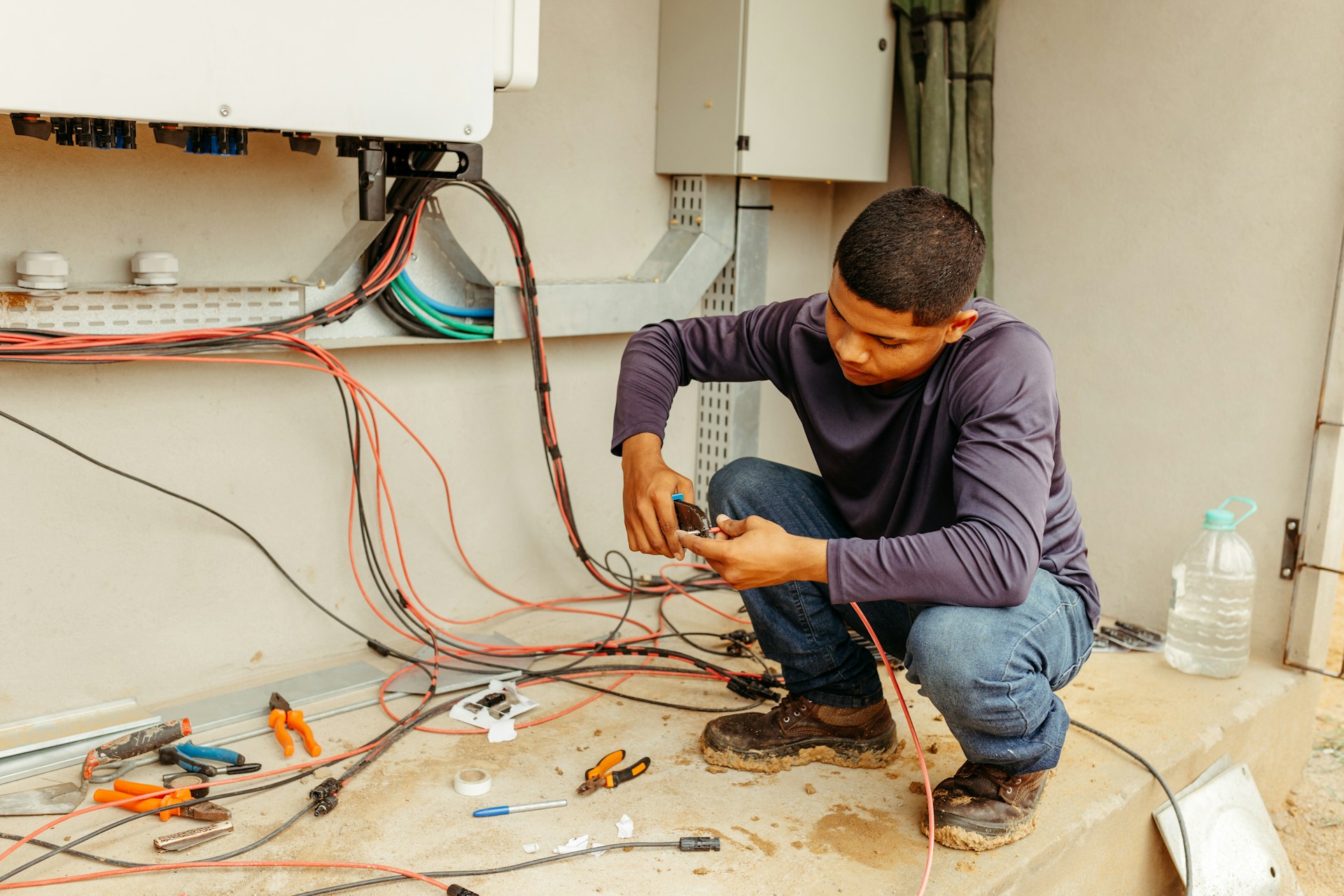 an electrician repairing a electrical system