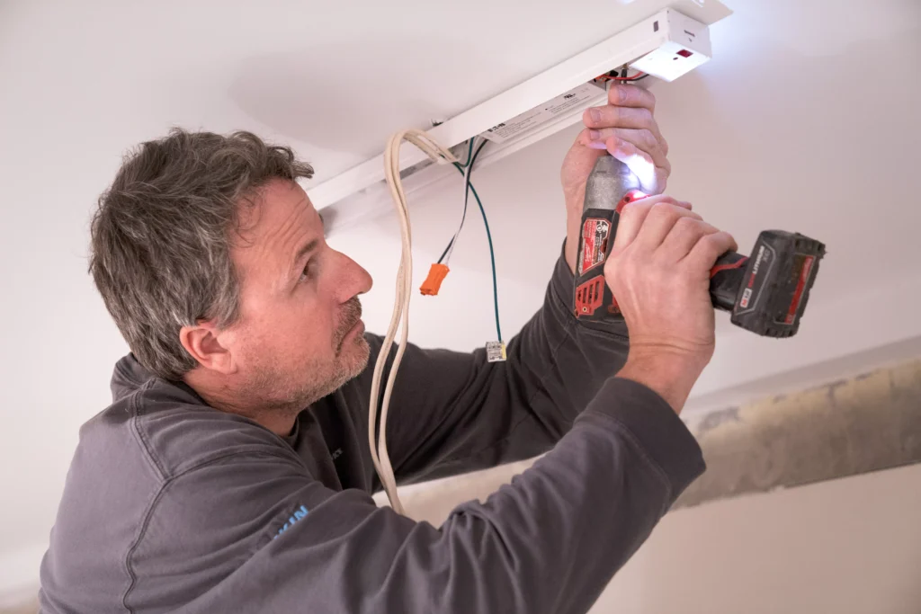 a electrician performing electrical services in roseville, mn.