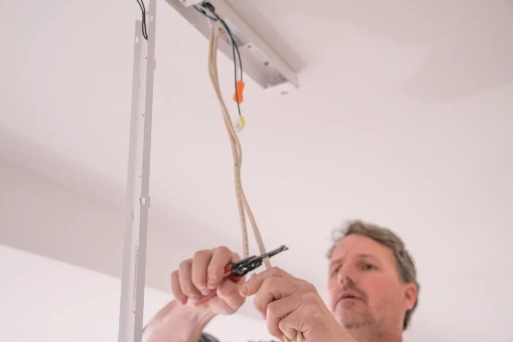 a electrician performing electrical services in golden valley, mn.