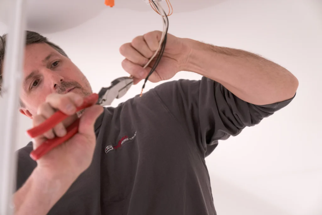 a electrician performing electrical services in shorewood, mn.