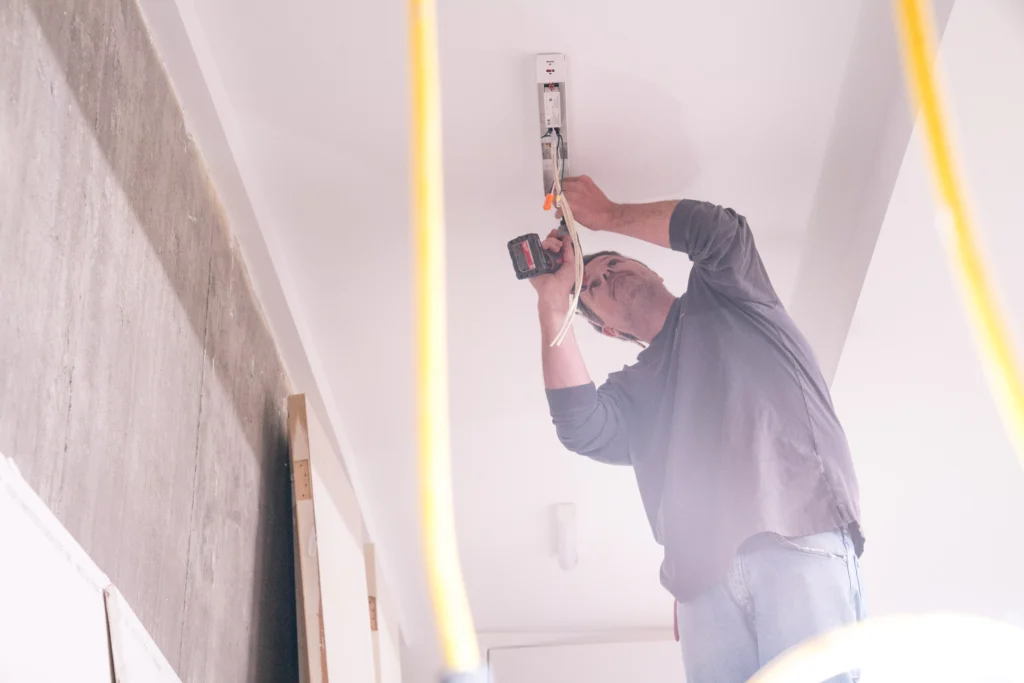 a electrician performing electrical services in ramsey, mn.