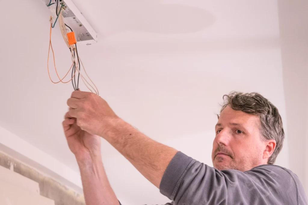 a electrician performing electrical services in excelsior, mn.