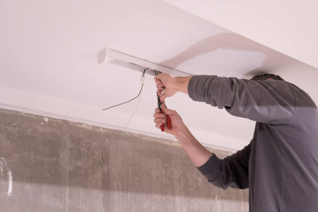 a person performing electrical services in eagan, mn.