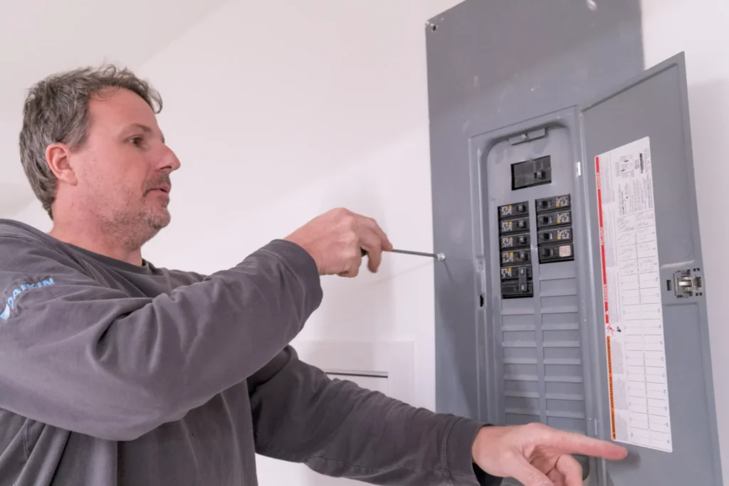 a electrician performing electrical services in minneapolis, mn.