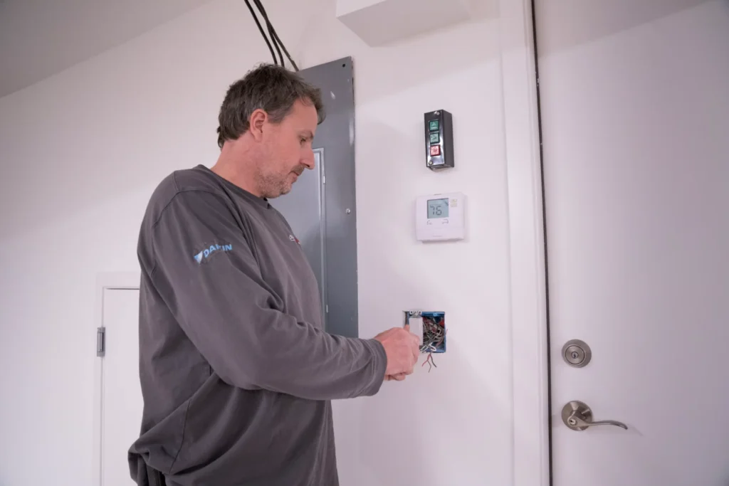 a electrician performing electrical services in minneapolis, mn.