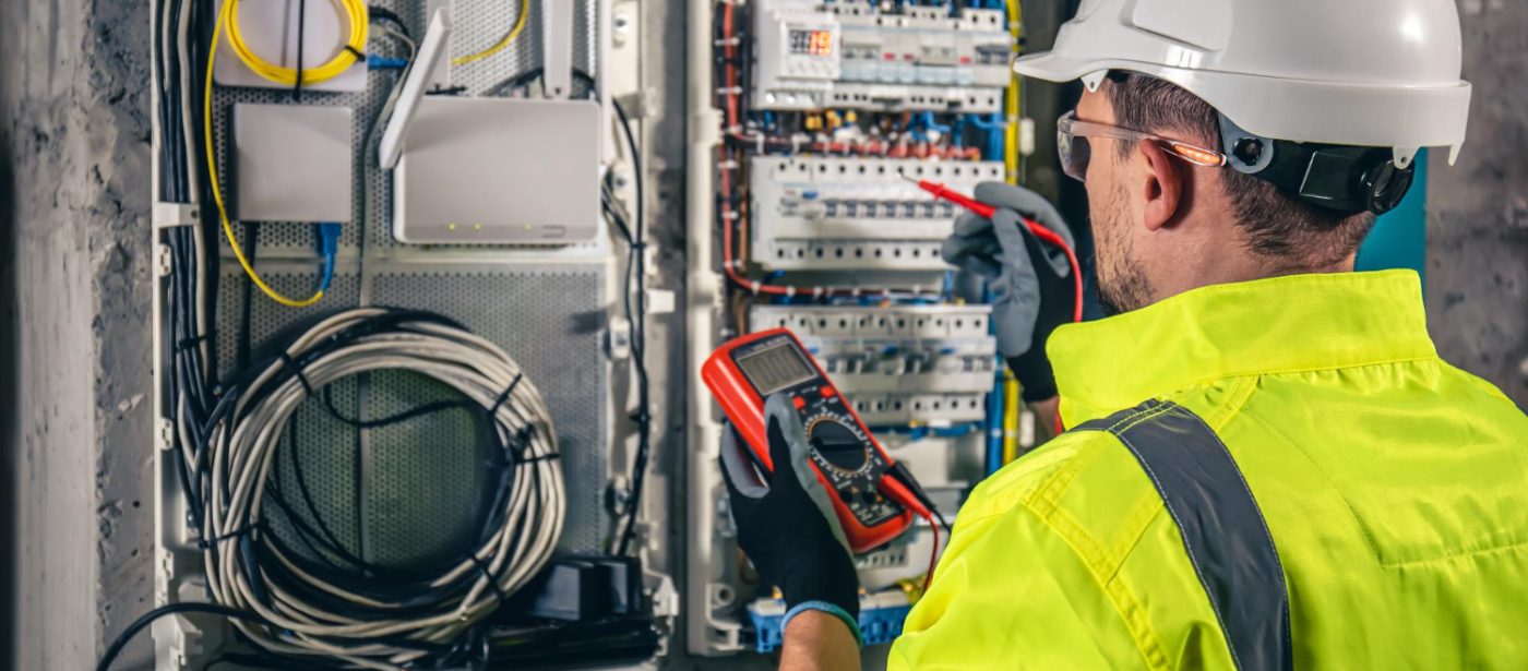 An electrician working in electrical system