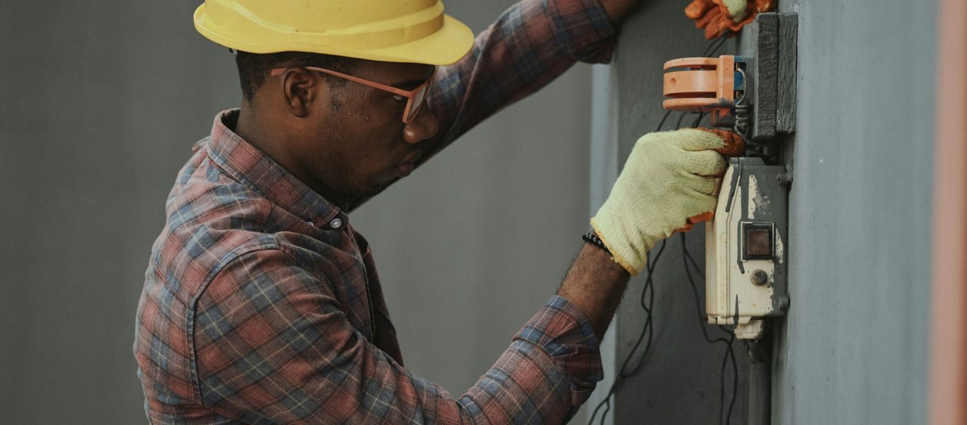 A professional technician working in electrical system